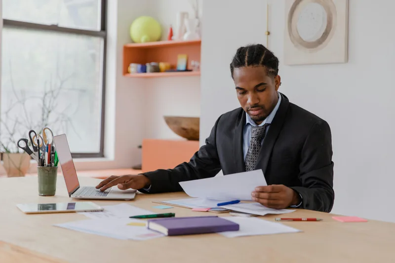 Financial professional reviewing Bright Money company registration documents